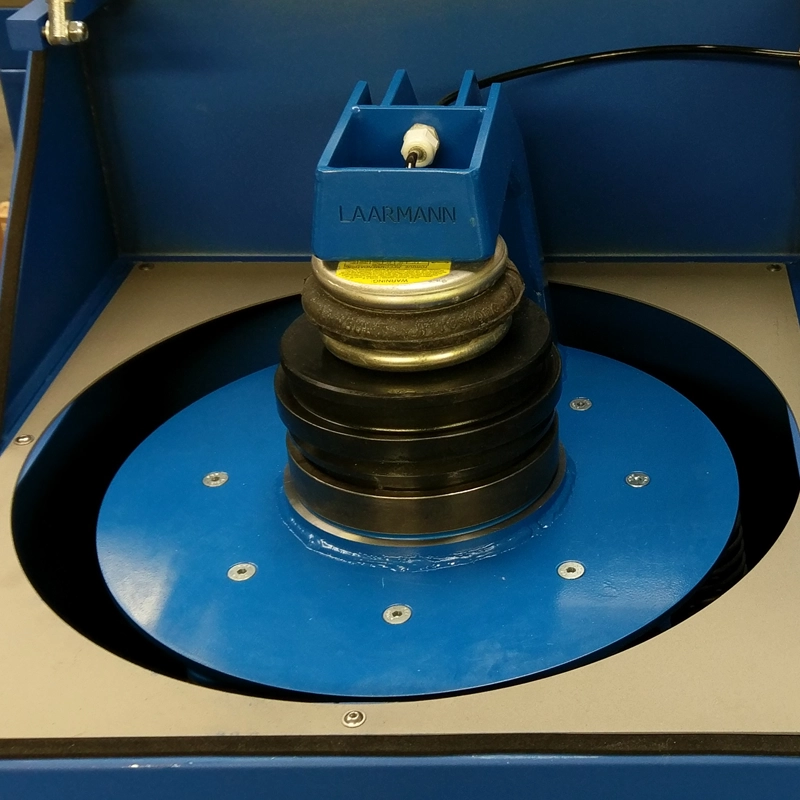 Grinding bowl and airbag clamping system inside the LAARMANN LM250 Pulveriser Ring Mill